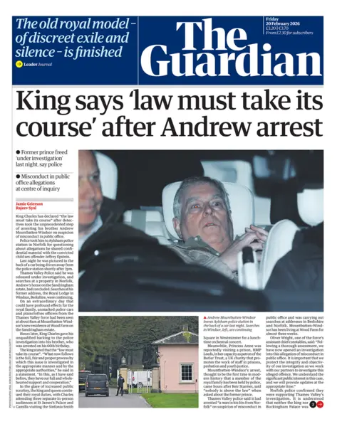 The front page of the Guardian reads: 