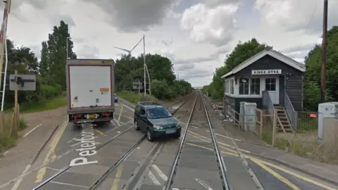 Google King's Dyke level crossing