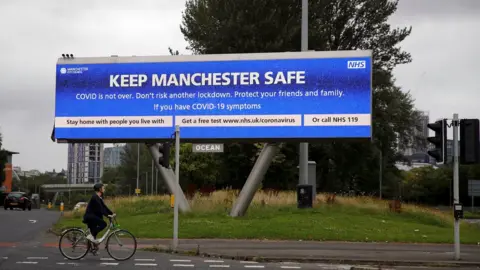 Reuters Coronavirus signage in Manchester