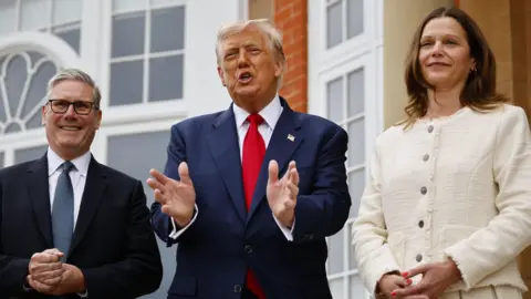 EPA Keir Starmer meets the American president with his wife Victoria.