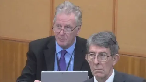 Warwickshire County Council public webcast Councillors sitting in a meeting