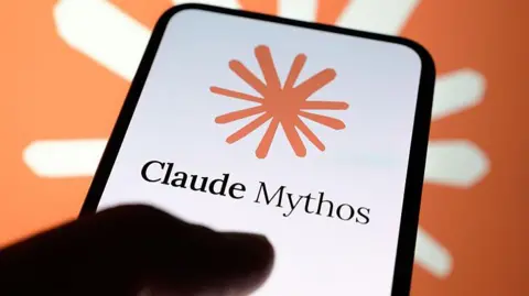 A phone with the orange Anthropic logo on the screen. Below is written "Claude Mythos"