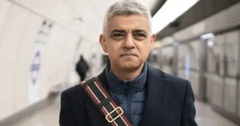 PA Media Sadiq Khan at an Elizabeth line station