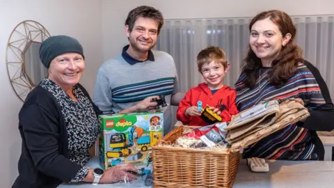 Tim George Caroline Ward, Community Development Lead for Waterbeach, welcomes first new residents
