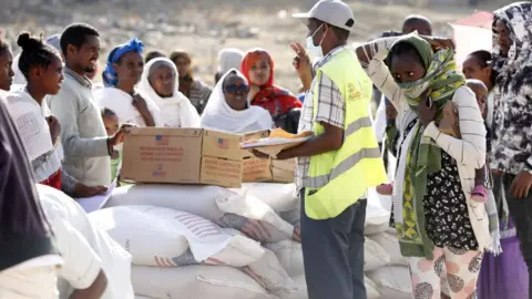 Getty Images USAid food aid being distributed in Mekelle on 8 March 2021