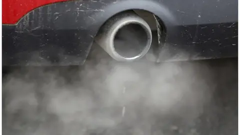 Reuters Fumes from car exhaust