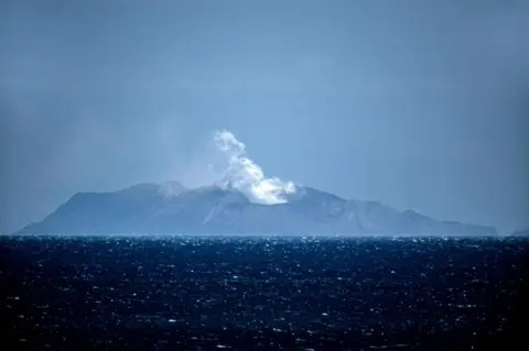 Getty Images Steam rises from the White Island volcano