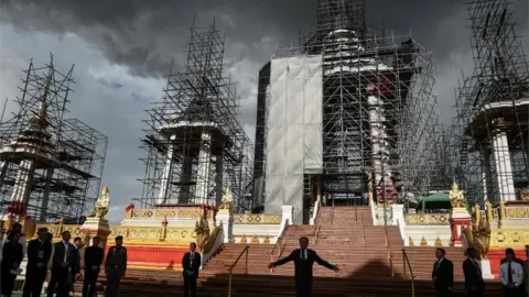AFP Thai PM Prayuth Chan-Ocha in front of the cremation structure for late King Bhumibol Adulyadej (13 July 2017)