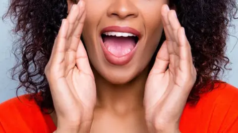 Getty Images A woman shouting