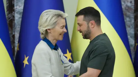 EPA Ukrainian President Volodymyr Zelensky (R) and European Commission President Ursula Von der Leyen (L) shake hands during their joint press conference in Kyiv, Ukraine, 20 September 2024.