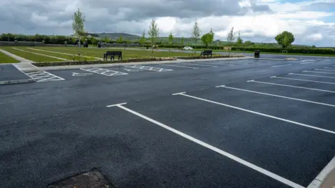 DCSDC A car park with a number of spaces