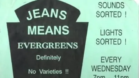 Mich Elle A poster says 'Jeans Means Evergreens, definitely no varieties!' Sounds sorted, Lights sorted