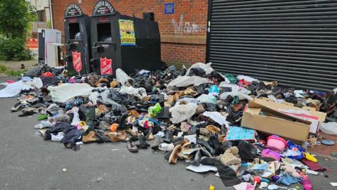 Fly tipping near a charity shop in West Bromwich