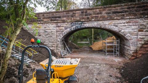 View of Great Musgrave Bridge with concrete under the arch after concrete removal
