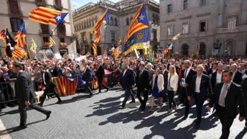 Reuters Rally in support of mayors facing the threat of arrest