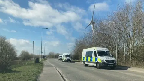 Three police vans