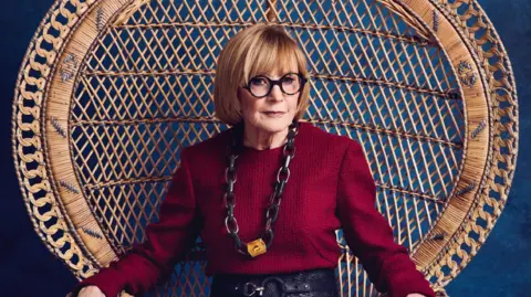 Saga/PA Media Anne Robinson sitting in a chair on the front cover of June's Saga magazine