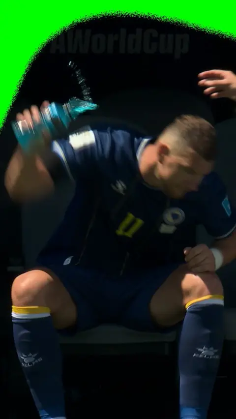 Edin Dzeko throws bottle after being taken off