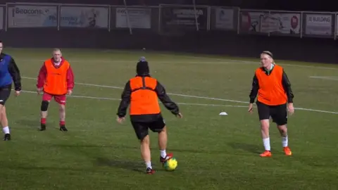 women playing walking football