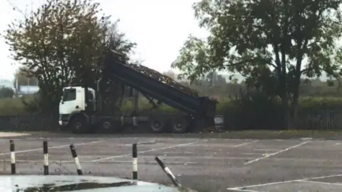 Environment Agency A tipper truck dumping waste