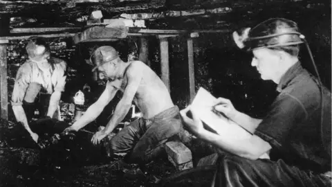 R Saidman Photo showing Henry Moore sketching working coalminers at Wheldale Colliery in 1942