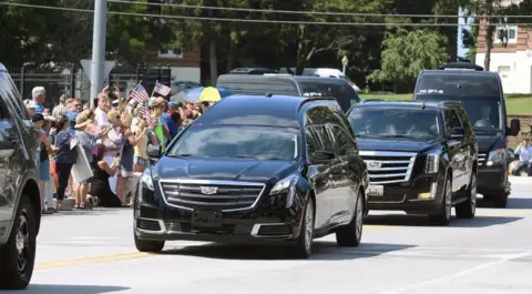 Reuters A hearse containing the body of Senator John McCain arrives for his burial