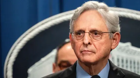 Getty Images US Attorney General Merrick Garland at the press conference announcing the lawsuit.