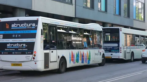 BBC LibertyBus buses outside station