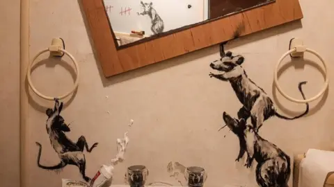 Banksy Bansky's latest artwork showing a group of rats in his bathroom