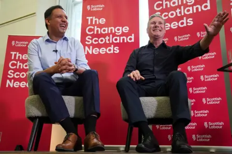 PA Media Scottish Labour leader Anas Sarwar and Sir Keir Starmer addressed party supporters in Rutherglen