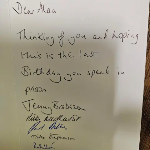 Ipswich Amnesty Group hand written text on a greetings card which says ' dear Alaa, Thinking of you and hoping this is the last birthday you spend in prison'.