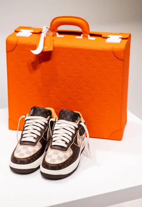 EPA A pair of limited edition Louis Vuitton Nike Air Force 1 sneakers, created by the late US designer Virgil Abloh