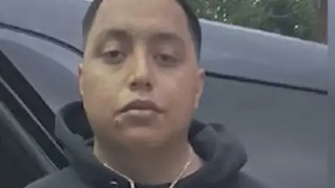 Police handout The suspect has been charged with "deadly conduct"