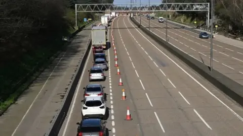 Getty Images Queue of traffic on the approach to the M25 closure