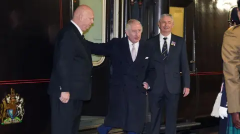 King Charles is seen exiting the royal train in 2023