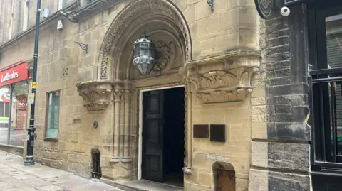 Entrance to an old stone building