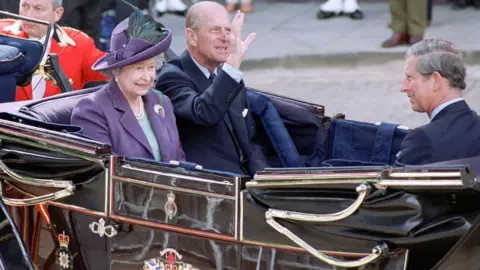 Getty Images The Queen, Prince Phillip and Prince Charles arrive for the State Opening of the Scottish Parliament in Edinburgh in July 1999