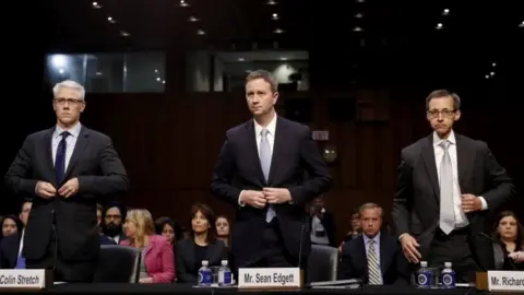 EPA Colin Stretch, general counsel for Facebook (L), Sean Edgett, acting general counsel for Twitter (C) and Richard Salgado (R), director of law enforcement and information security at Google, testify before the Senate Judiciary committee.