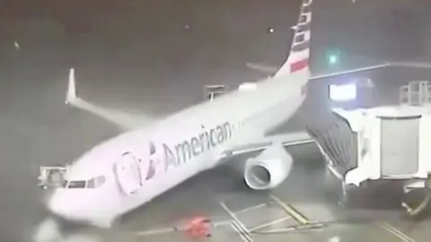 Plane being blown by wind