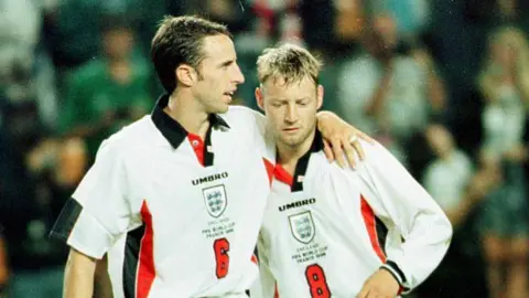 Gareth Southgate puts an arm around David Batty