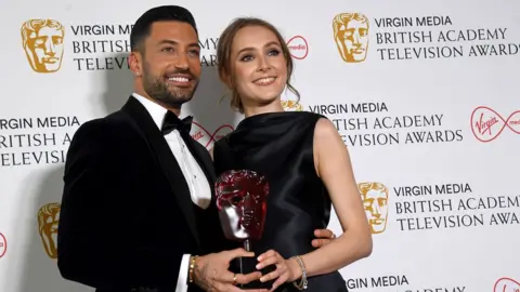 EPA Rose Ayling-Ellis and Giovanni Pernice with their Bafta Award