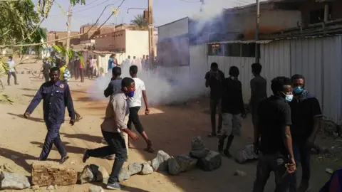 Getty Images Sudanese protesters in the capital Khartoum"s district of Burri on 24 February