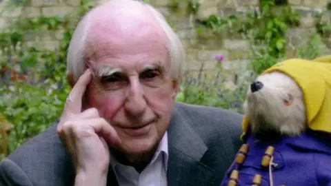 Getty Images Michael Bond with Paddington