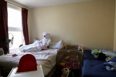 Katie Wilson The bedroom of six-year-old Ali and his baby sister Fatima