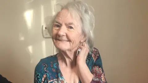 Kay Cantell Elderly woman sitting down