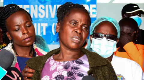 Reuters Agnes Cheptegei, the mother of Ugandan athlete Rebecca Cheptegei, who died after her boyfriend set her on fire, speaks in Eldoret, Kenya, on 5 September 2024