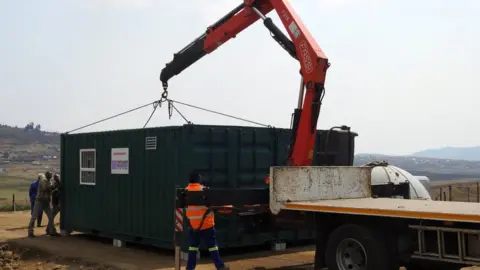 Jim Bowen A container full of equipment has been transported overseas