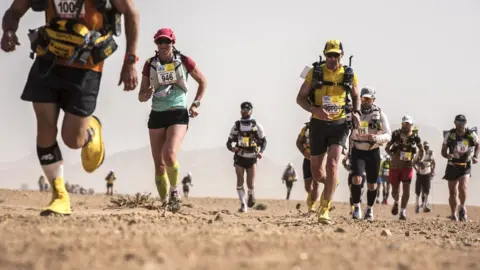 Getty Images People run in the Marathon des Sables