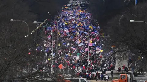 Getty Images Trump supporters march from the White House to the Capitol