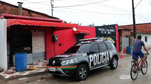EPA View of the facade of the nightclub where 14 people were killed in an early Saturday shootout, in Fortaleza, northeastern Brazil, on January 27, 2018.